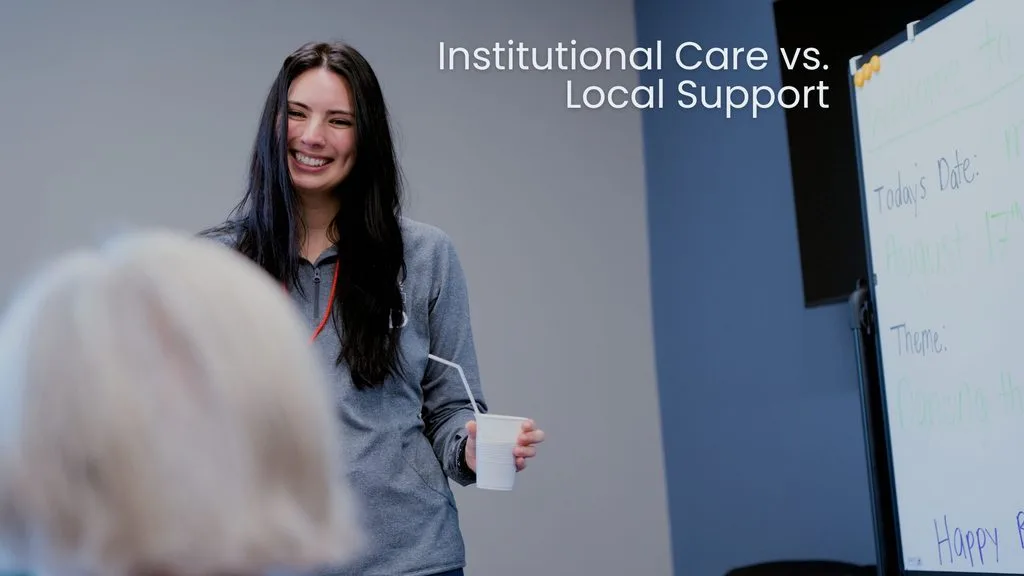 photo of Magnolia Center for Brain Health Program Director Lola Scamacca smiling at a program participant in Lancaster SC